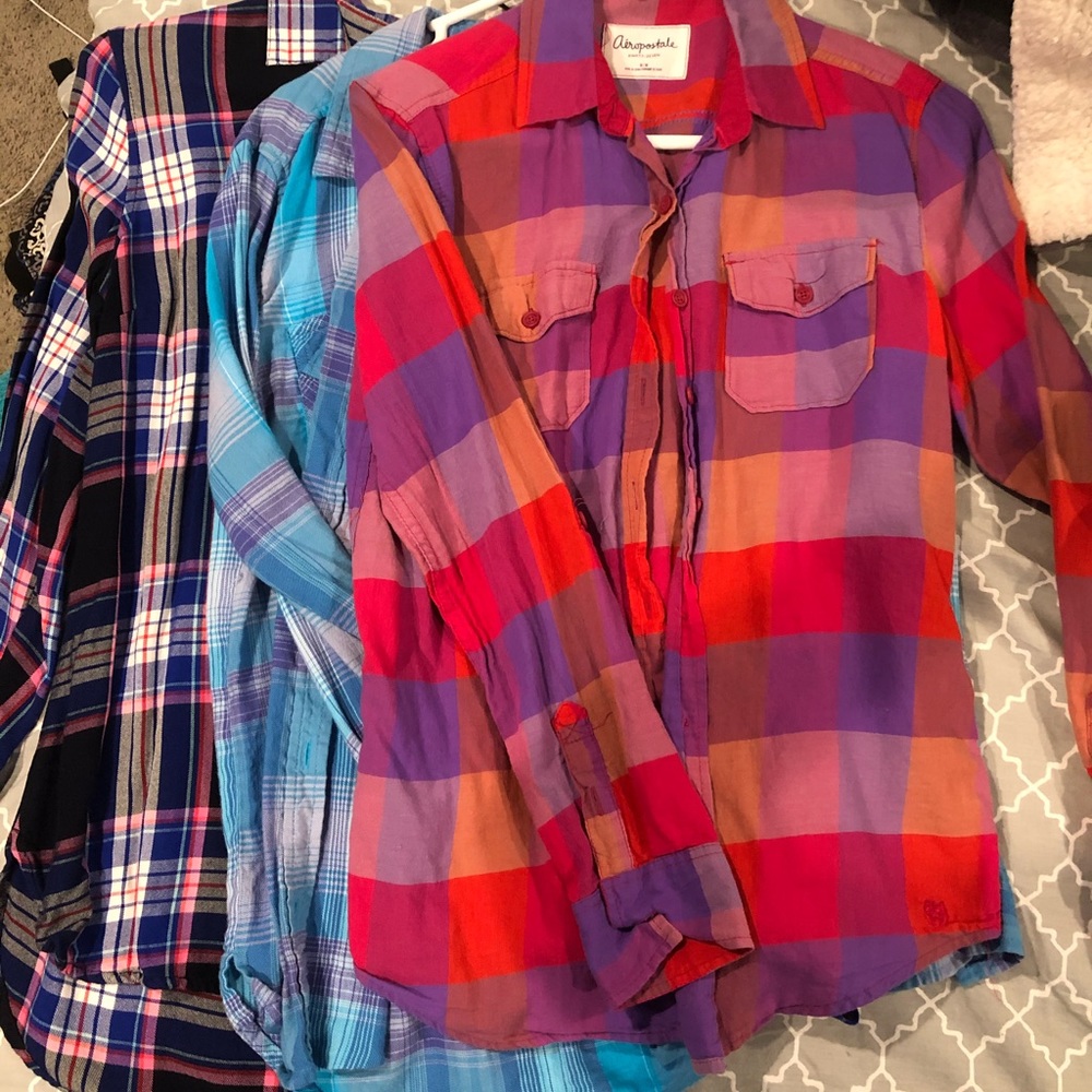 Three womens flannels